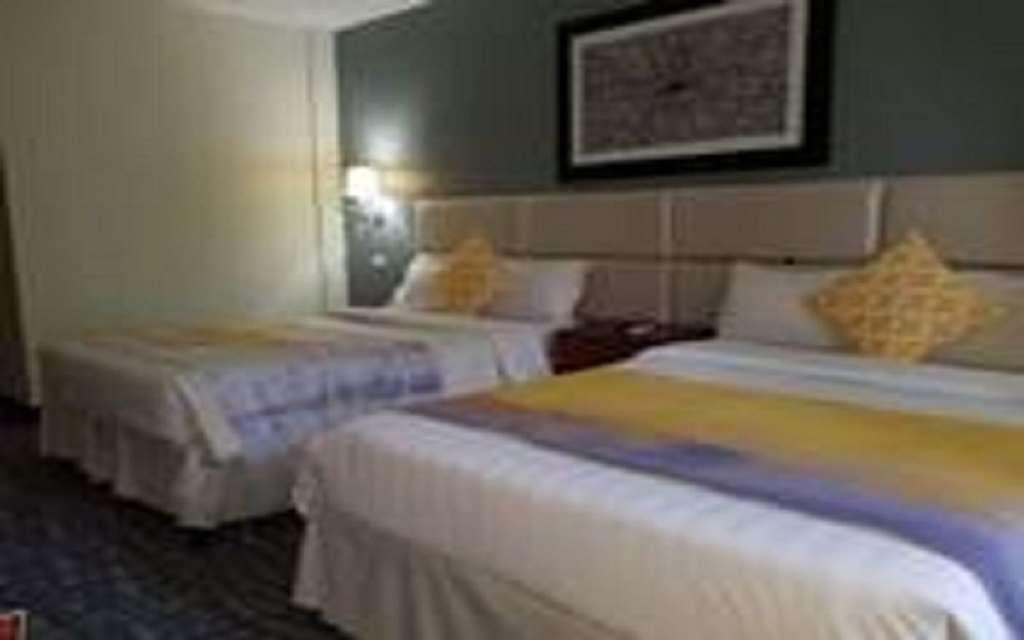 Century Hotel Garapan Rom bilde